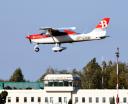 Tecnam P2008 JC należący do Bartolini Air w w locie nad dawnym terminalem łódzkiego lotniska (fot. Port Lotniczy Łódź)