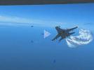 Rosyjski Su-27 podczas przelotu ataku na drona MQ-9 Reaper, fot. youtube
