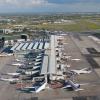 Lotnisko Chopina - widok z góry na terminal, samoloty i pas startowy (fot. FILMOLOT, lotnisko-chopina.pl)