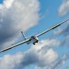 Szybowiec na niebie - widok z bliska z przodu (fot. Daniel Puciłowski Aviation Photography)